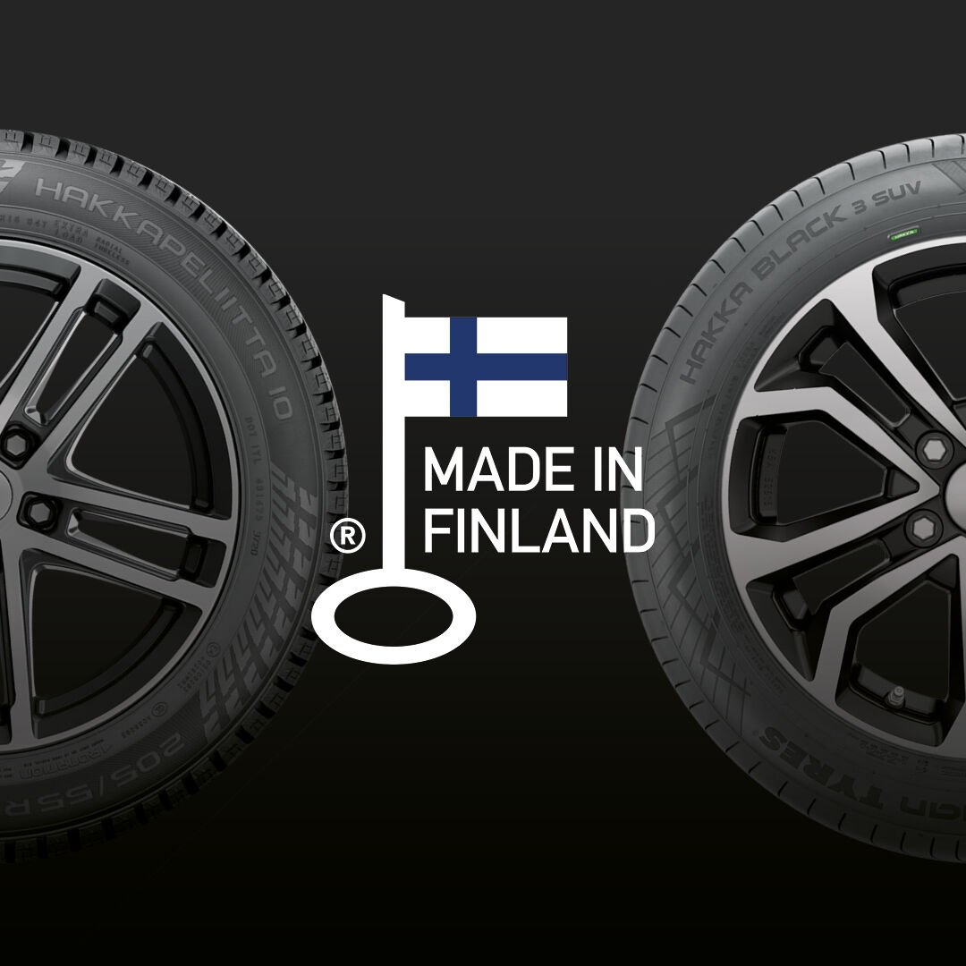 Halvparten av to dekk bak «Made in Finland»-ikonet