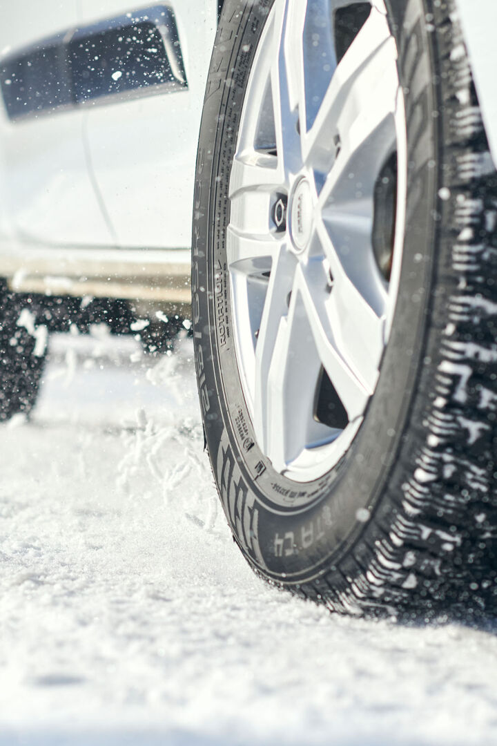 closeup of Nokian Tyres van tire in a snow
