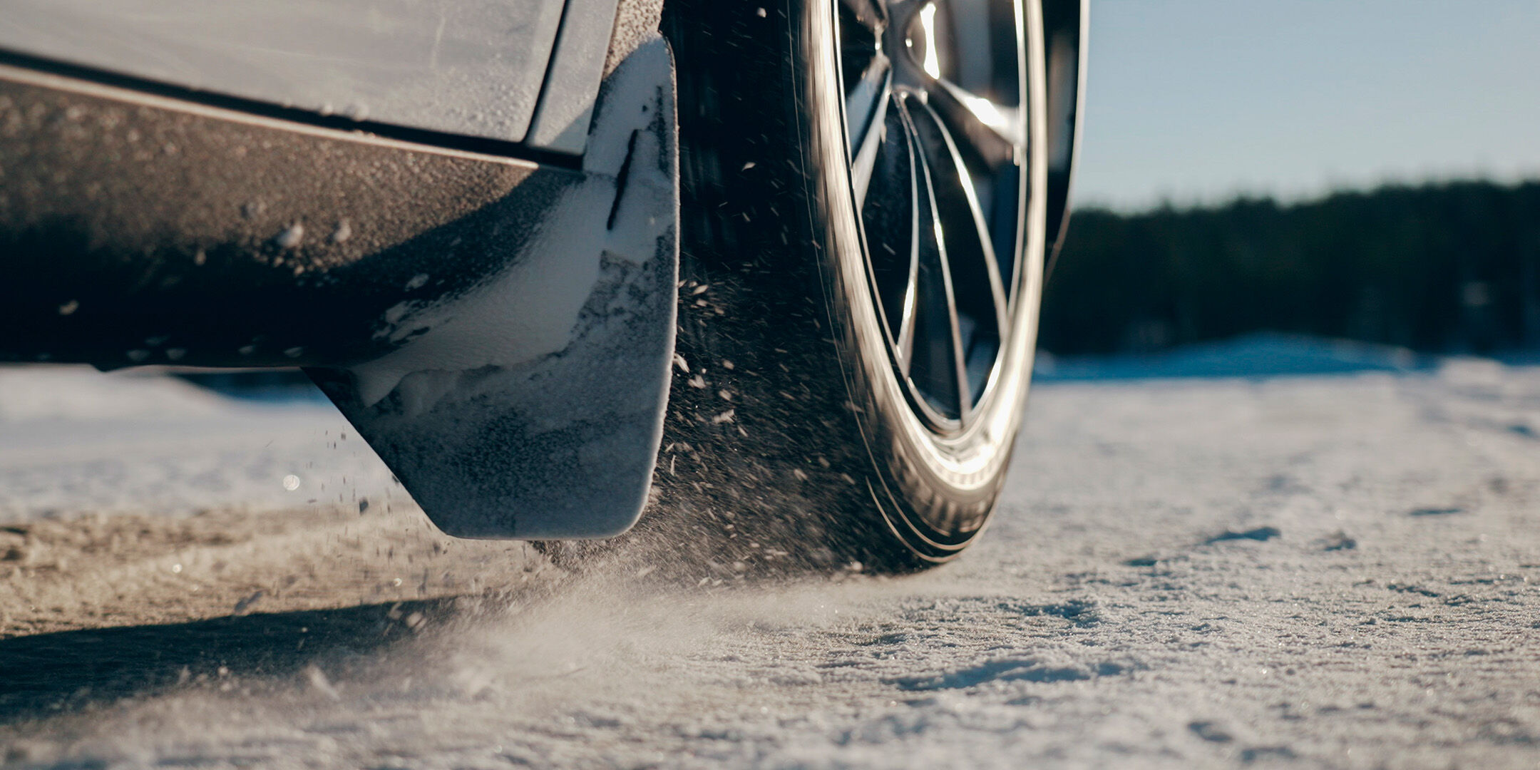 close up of a tire on icy road