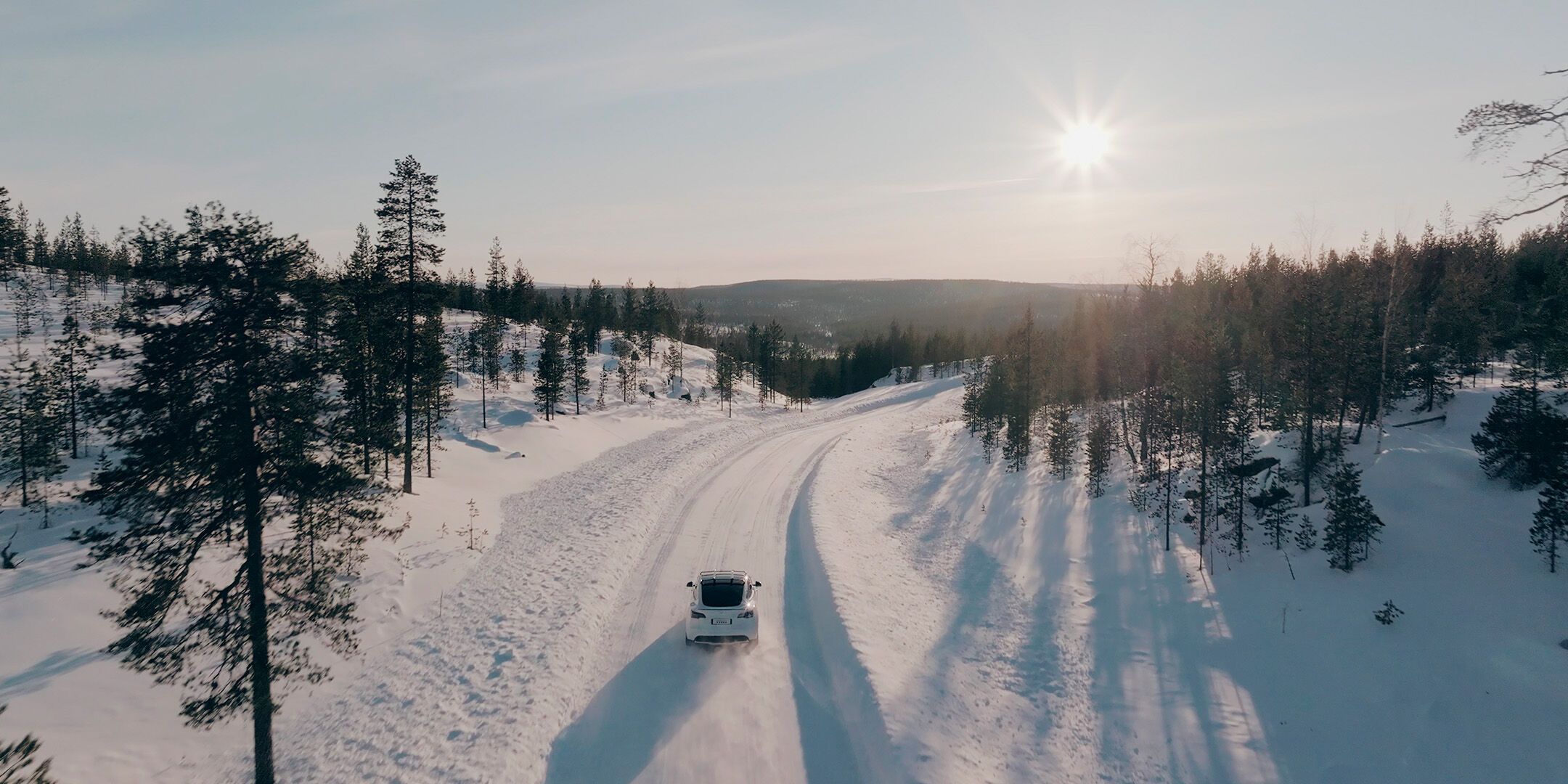 car driving on ice sun shining