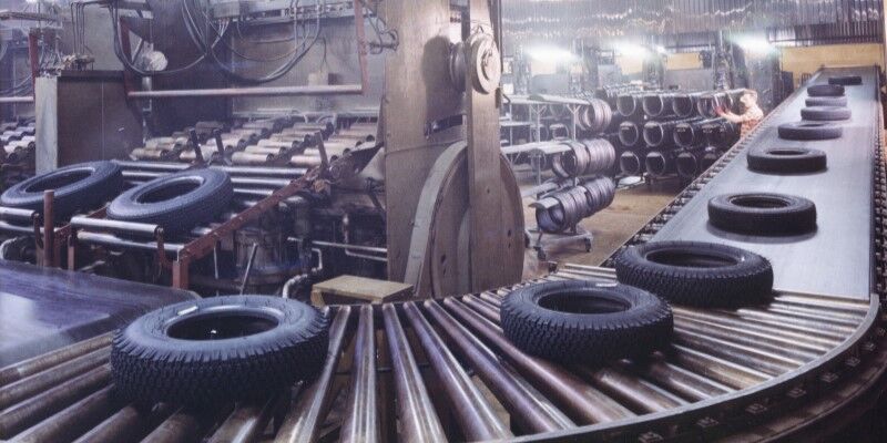 Tires moving on an automated line towards the next part of the production process