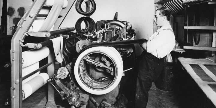A person assembling a tire.