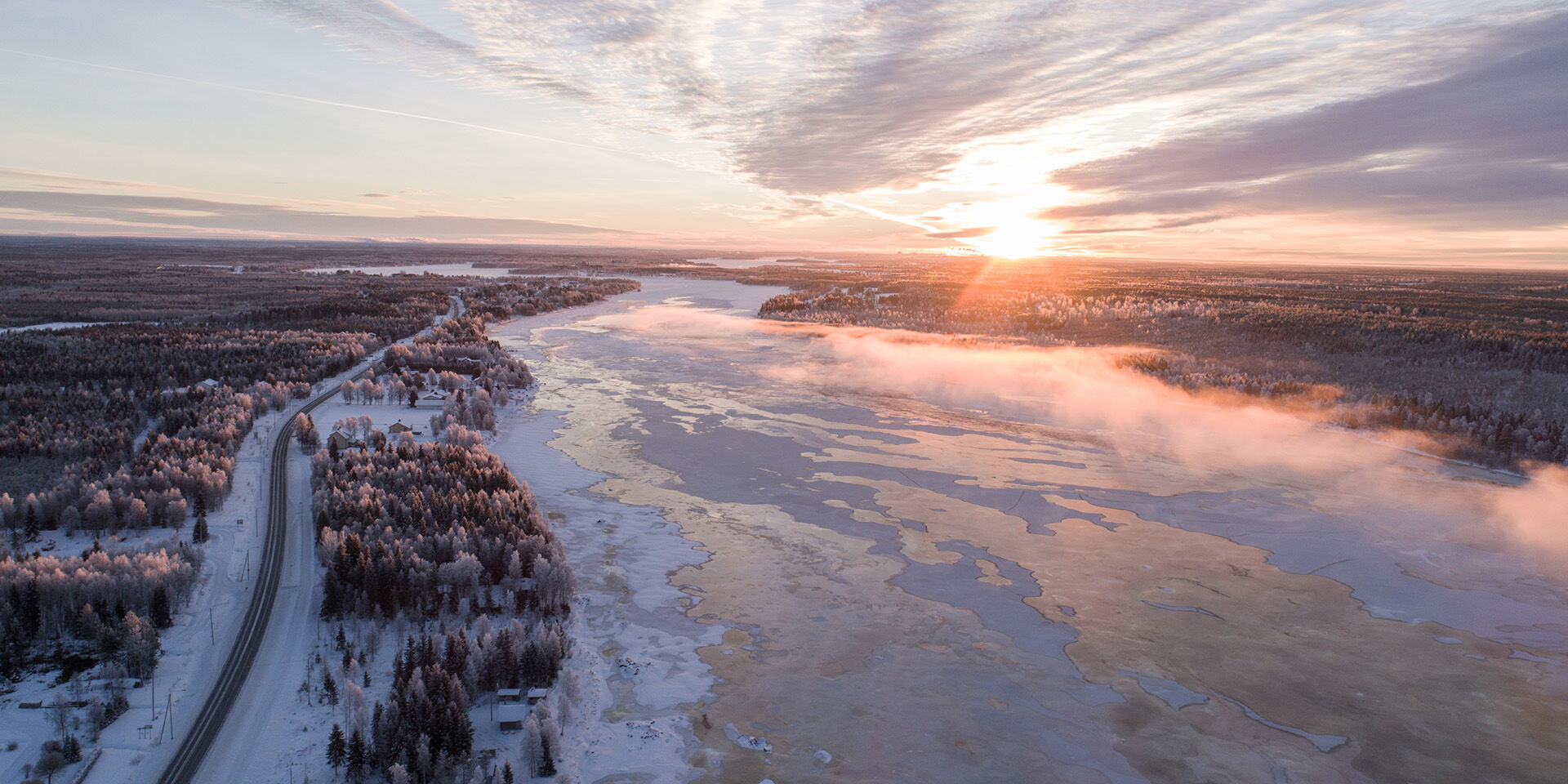 Sunset over a frozen lake